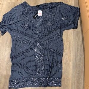 Le chateau beaded and sequin dress